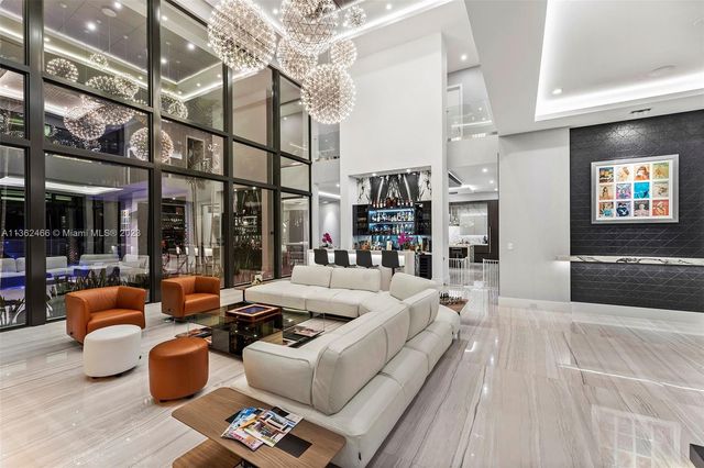 a building outdoor space with patio furniture and potted plants