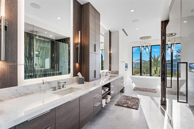 a view of swimming pool with outdoor seating