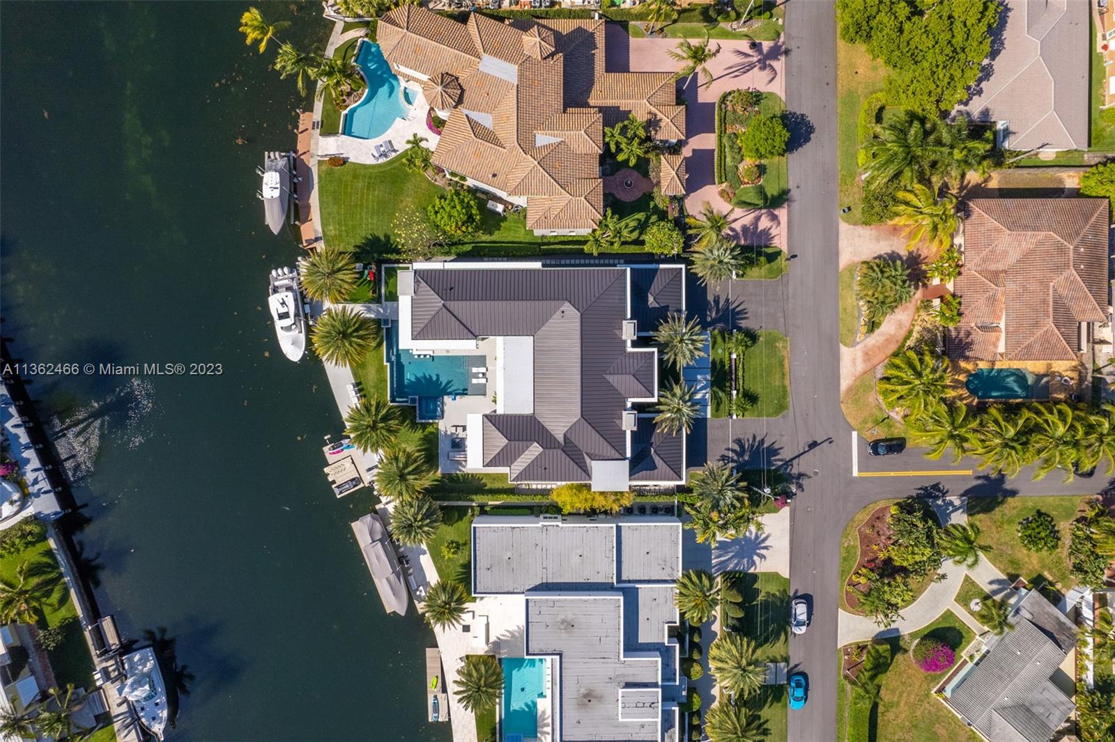 3101 Northeast 27th Avenue Lighthouse Point, FL 33064 - Photo 72 of 78 an aerial view of multi story residential apartment building with yard