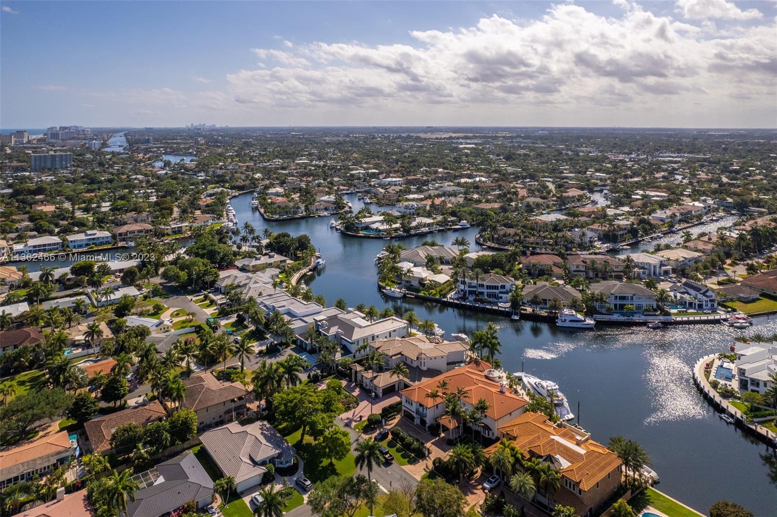 3101 Northeast 27th Avenue Lighthouse Point, FL 33064 - Photo 74 of 78 an aerial view of a city with lots of residential buildings