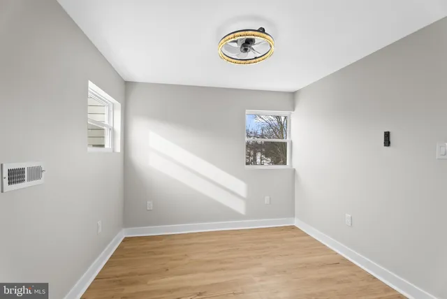 a view of a hallway with a window