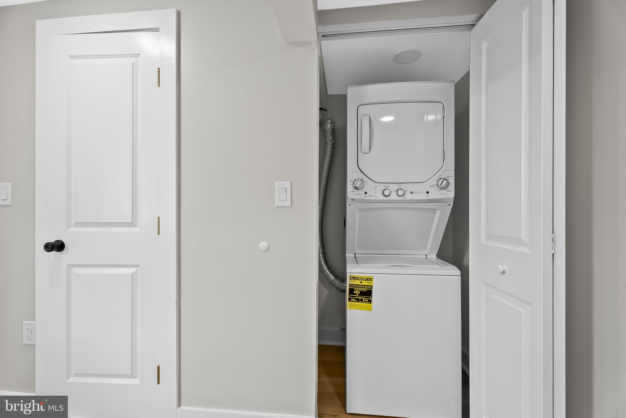432 Cook Street Hagerstown, MD 21740 - Photo 18 of 22 a close view of a utility room with dryer and washer