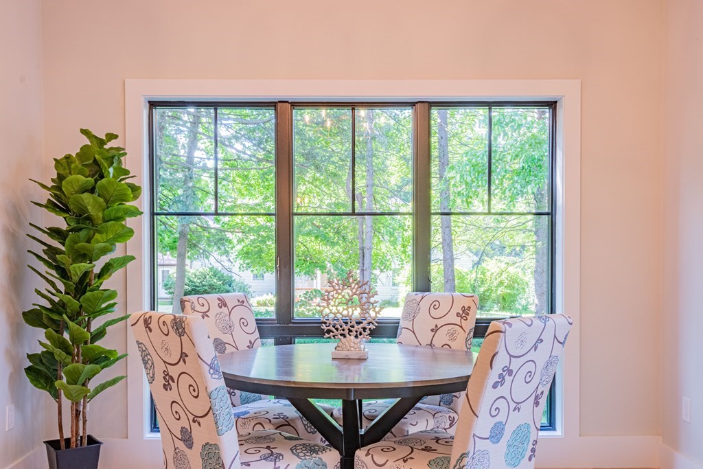 5 Kimball Road Lexington, MA 02421 - Photo 16 of 42 a view of a dining room with furniture window and outside view