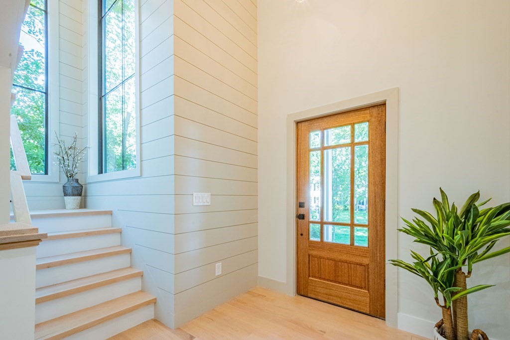 5 Kimball Road Lexington, MA 02421 - Photo 2 of 42 a view of front door with furniture and a potted plant