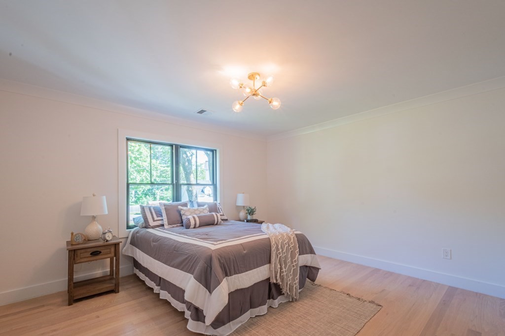 5 Kimball Road Lexington, MA 02421 - Photo 27 of 42 a bedroom with a bed and a window
