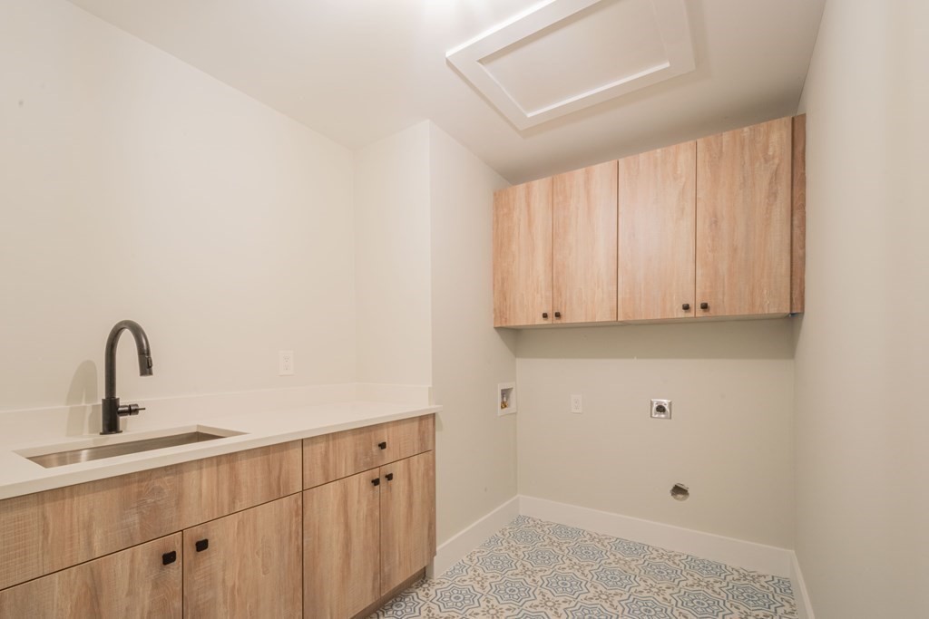 5 Kimball Road Lexington, MA 02421 - Photo 33 of 42 a bathroom with a sink and vanity
