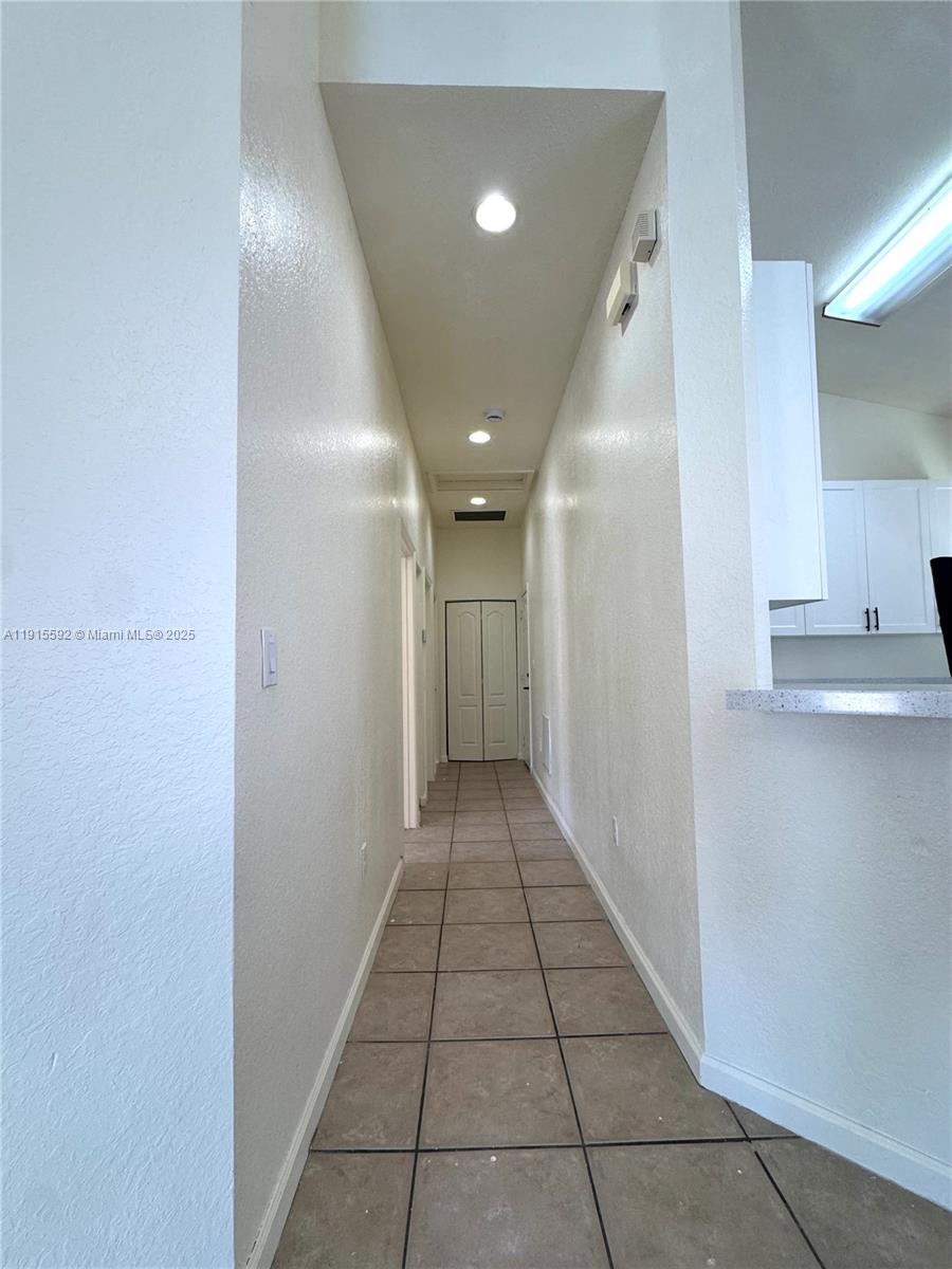 3725 Northeast 23rd Court Homestead, FL 33033 - Photo 13 of 25 a view of a hallway