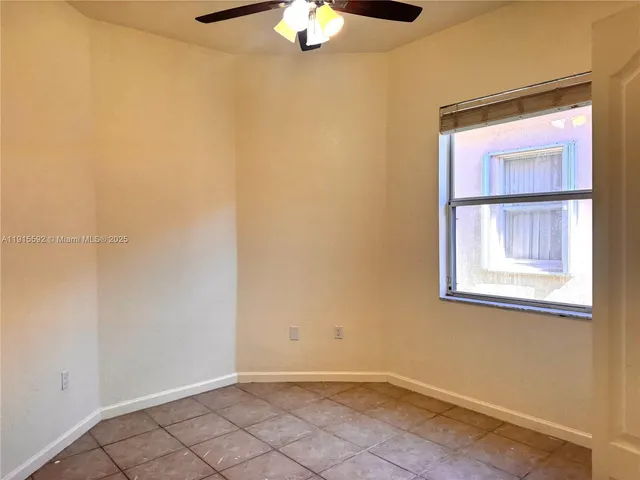 a bathroom with a toilet a sink and shower