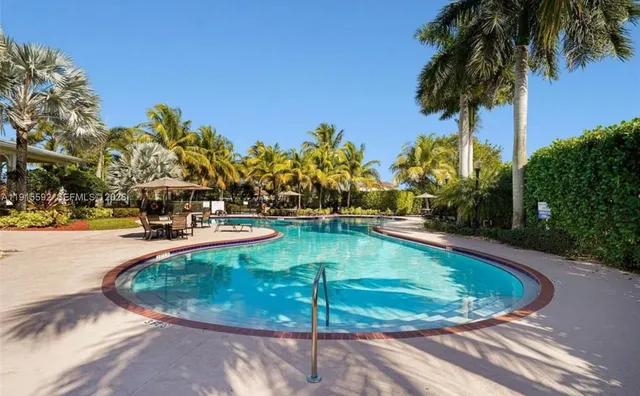a view of a swimming pool with a slide