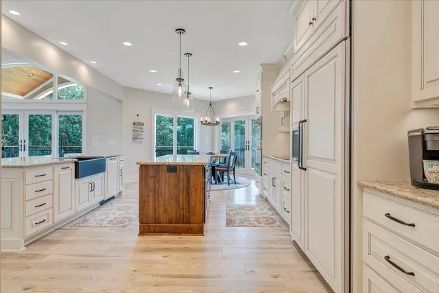 a view of a hallway with a white walls