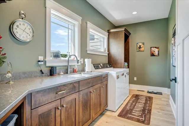 a view of a room with lots of wooden furniture