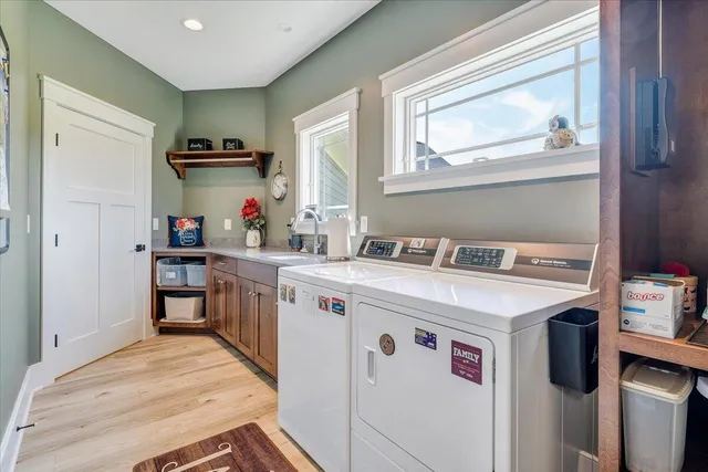 a view of a room with gym equipment and a table
