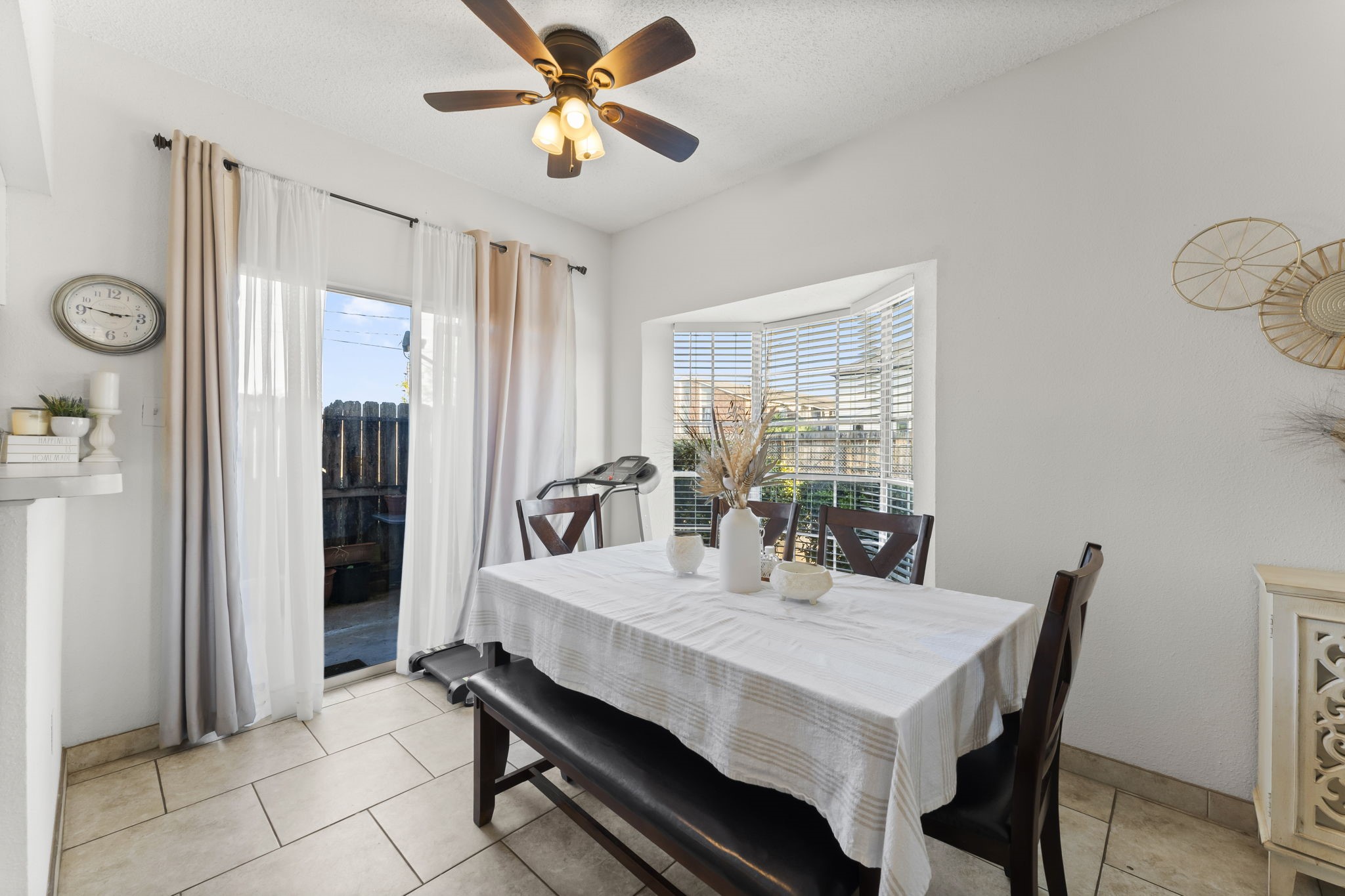 3600 Jeanetta Street, Unit 605 Houston, TX 77063 - Photo 12 of 29 a view of a dining room with furniture and window