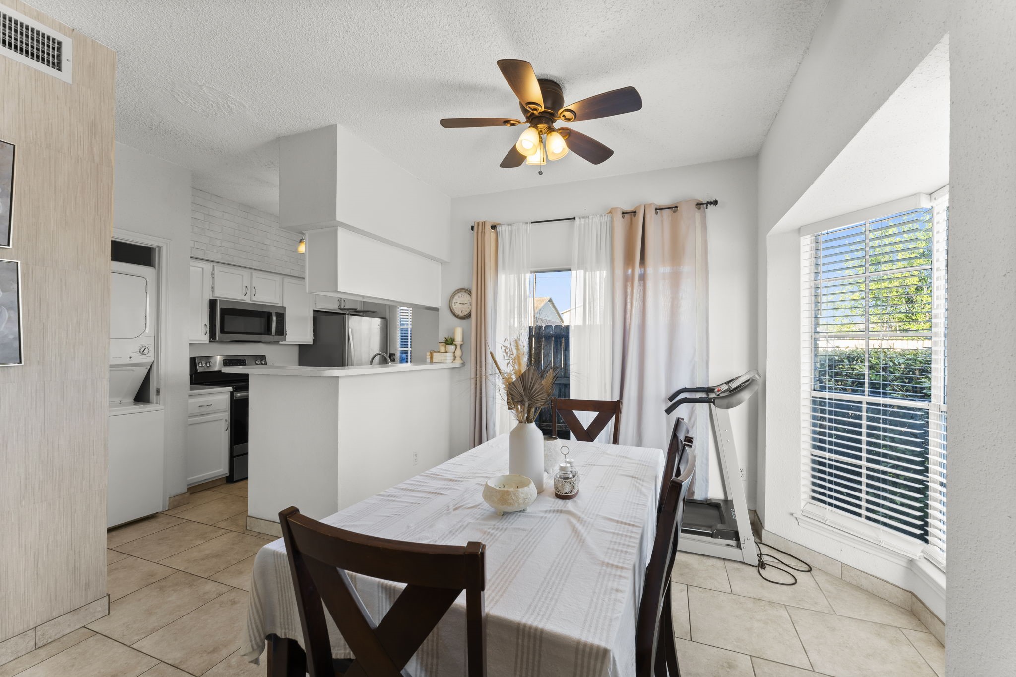 3600 Jeanetta Street, Unit 605 Houston, TX 77063 - Photo 14 of 29 a view of a dining room with furniture window and wooden floor