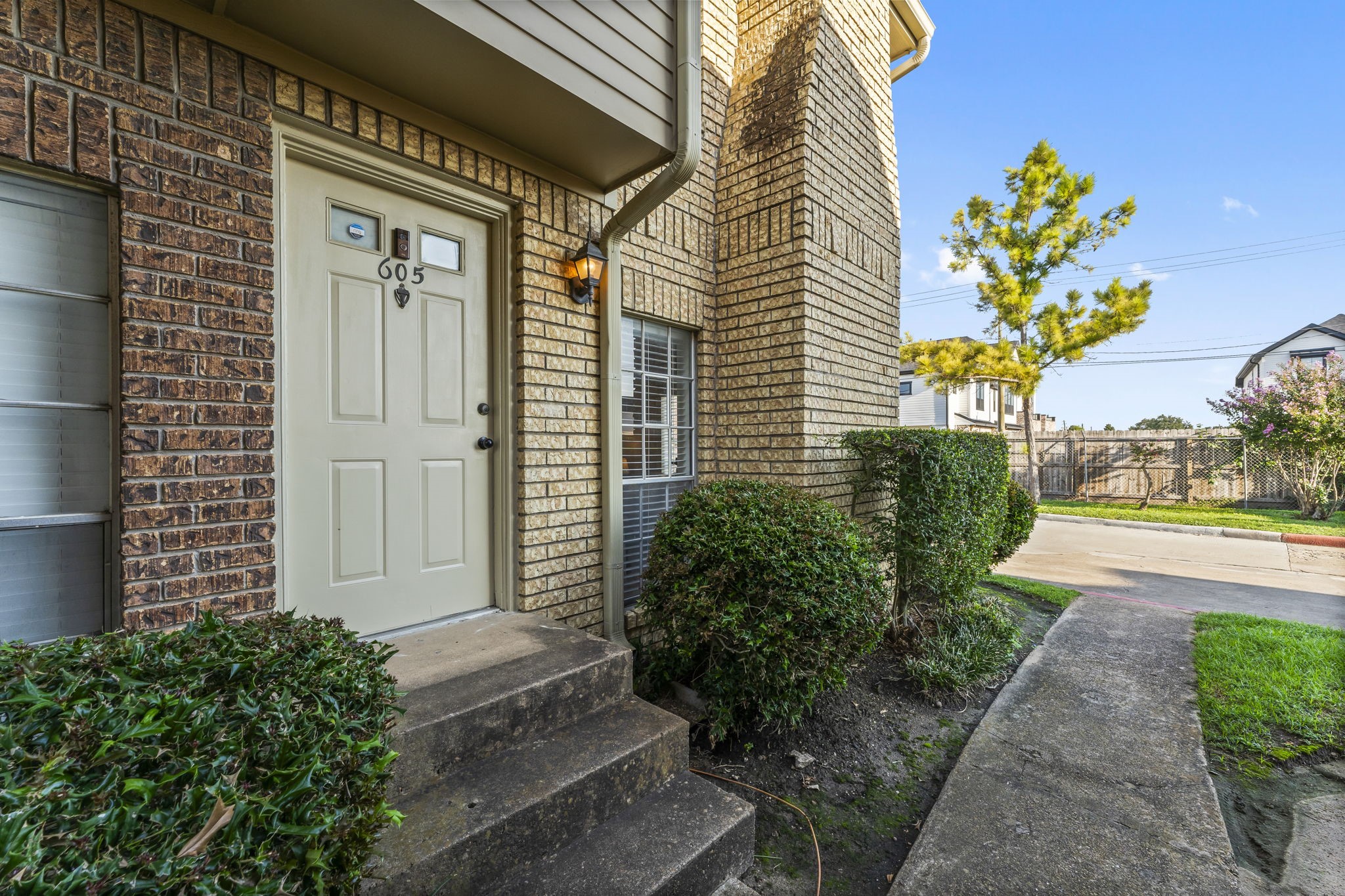 3600 Jeanetta Street, Unit 605 Houston, TX 77063 - Photo 2 of 29 a front view of a house with a yard