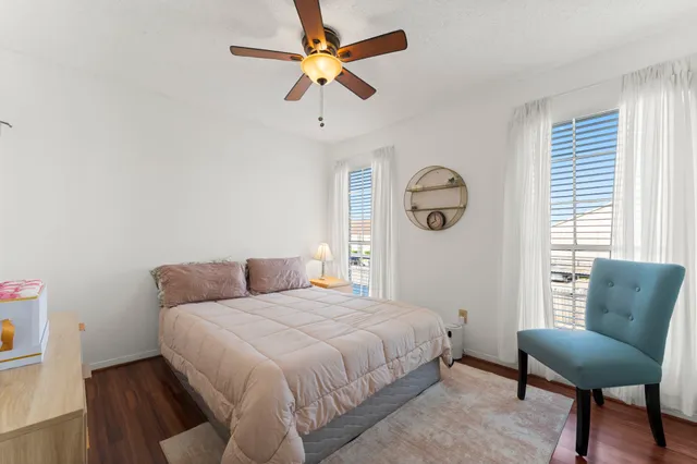 a bedroom with a bed furniture and a window