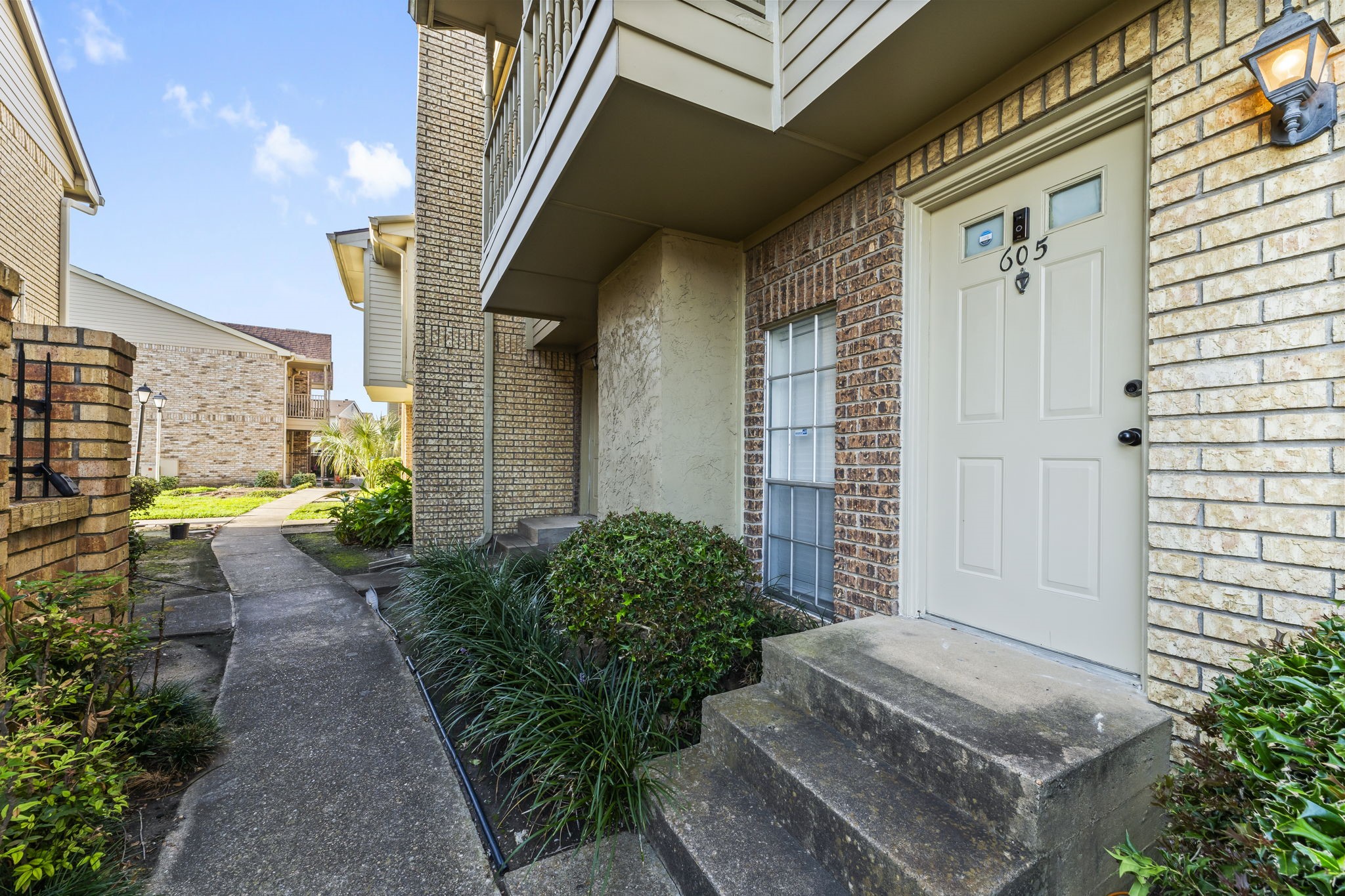3600 Jeanetta Street, Unit 605 Houston, TX 77063 - Photo 3 of 29 a view of house with backyard and outdoor seating