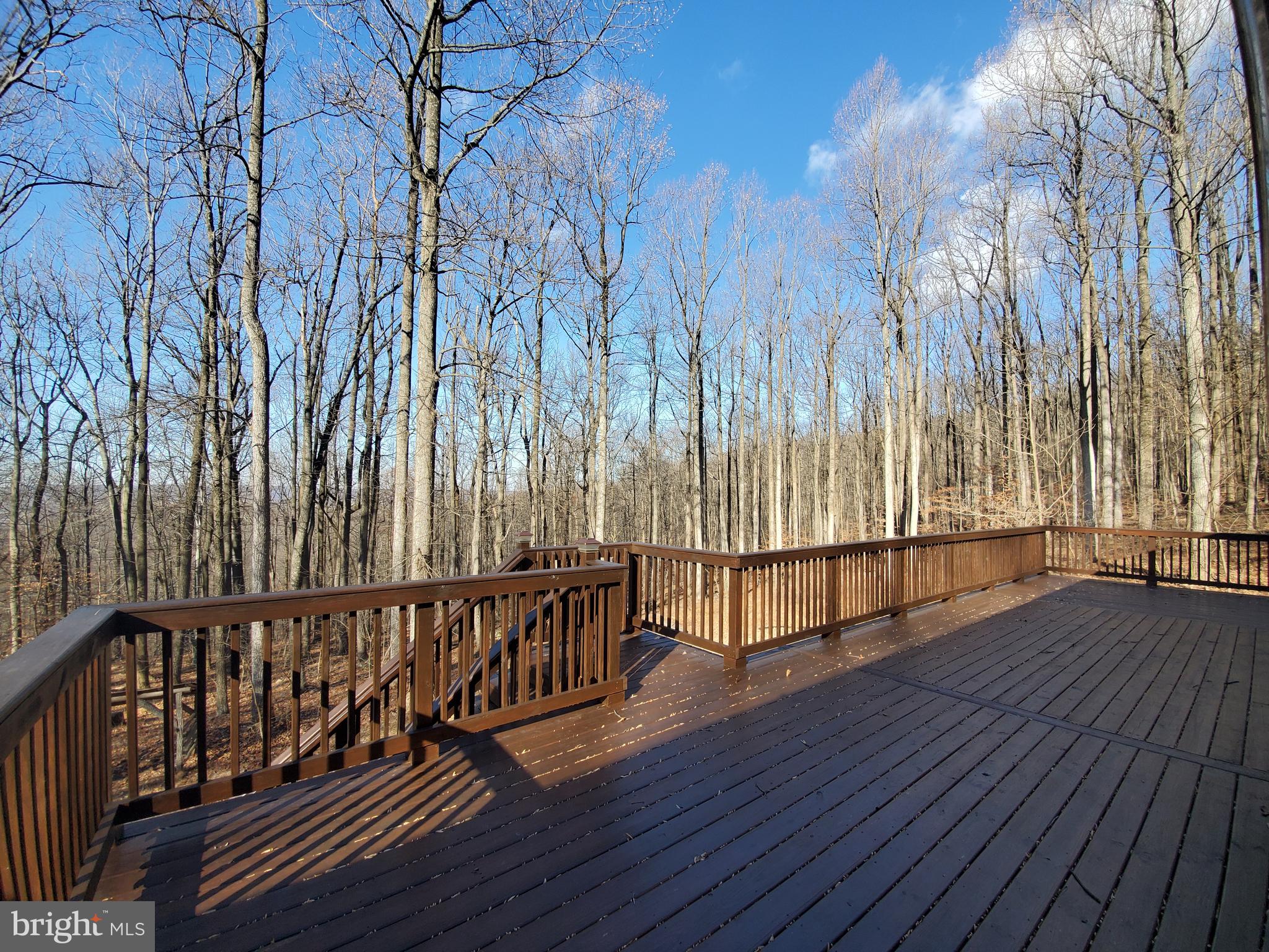 4742 Coxey Brown Road Frederick, MD 21702 - Photo 23 of 33 Enormous rear and side deck. Gorgeous views.