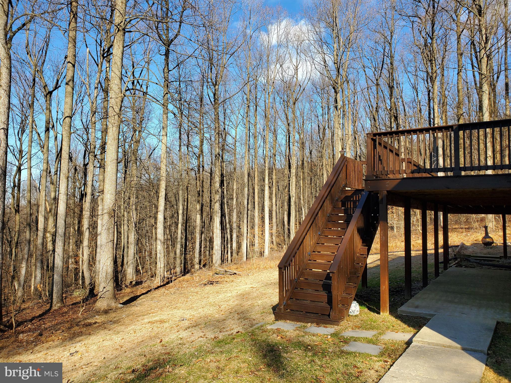 4742 Coxey Brown Road Frederick, MD 21702 - Photo 26 of 33 Upper level deck and lower level patio.