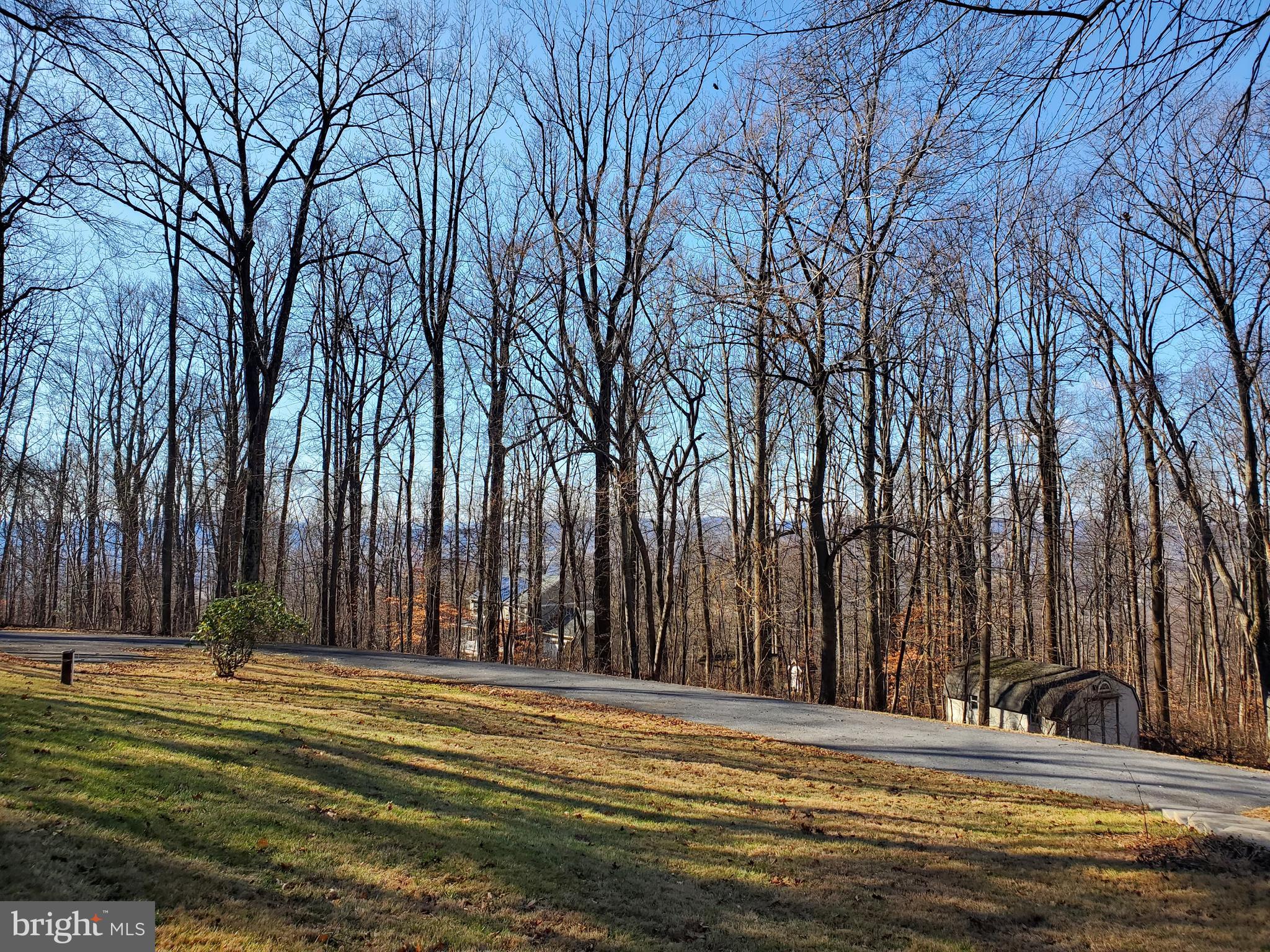 4742 Coxey Brown Road Frederick, MD 21702 - Photo 33 of 33 Extended paved driveway with parking pad.