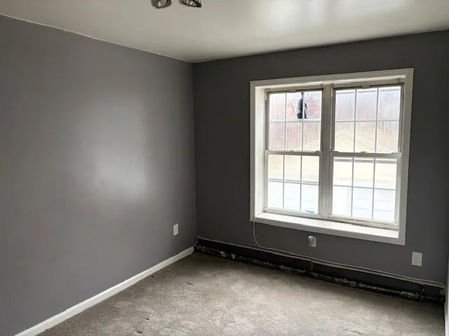 an empty room with a window