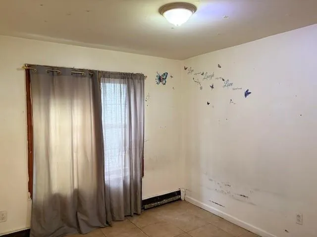 an empty room with a door