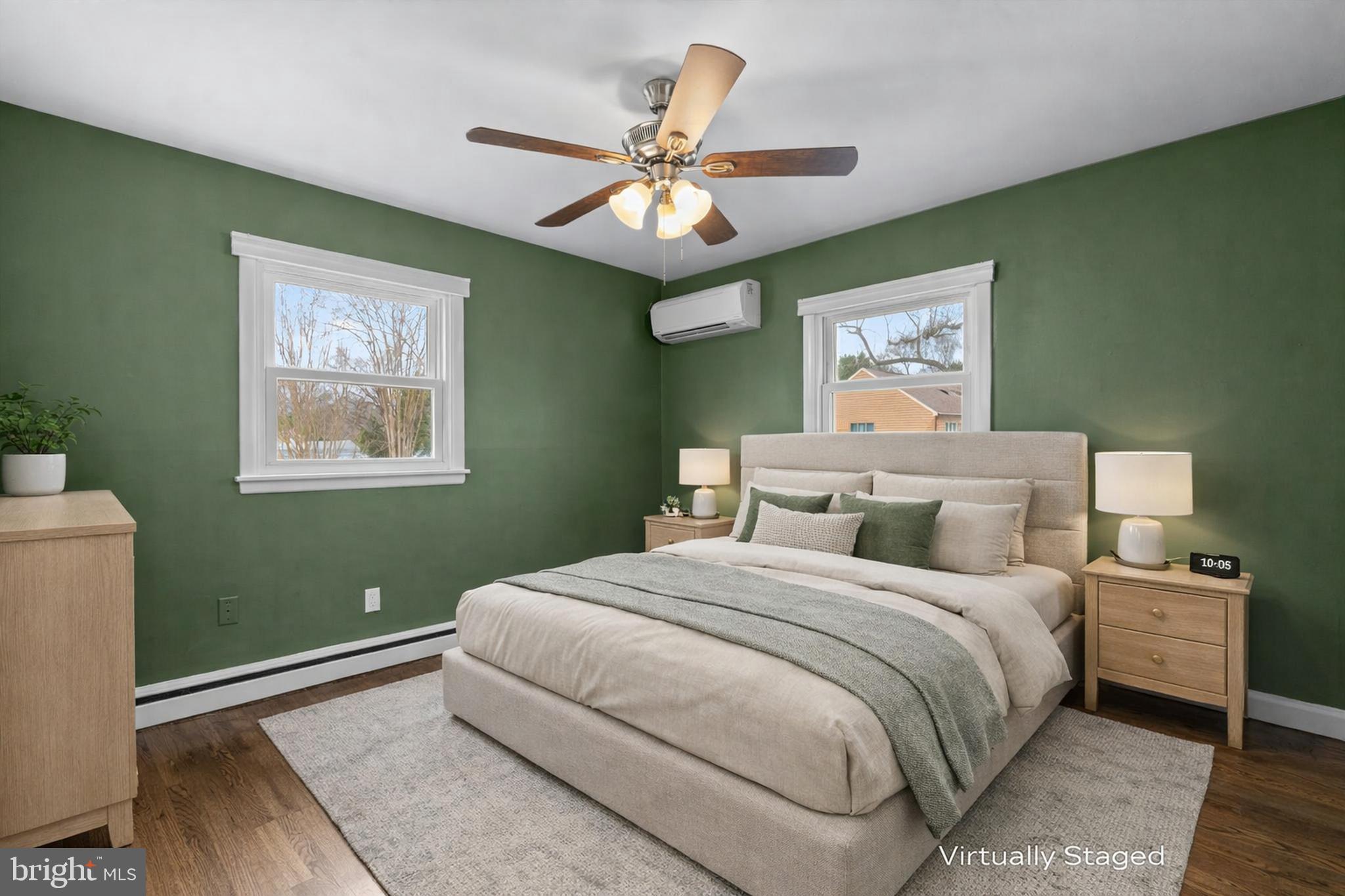 226 Maryland Way Edgewater, MD 21037 - Photo 8 of 30 a bedroom with a large bed and a chandelier