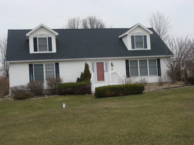 2387 North 24th Road Marseilles, IL 61341 - Photo 1 of 23 a front view of a house with a garden