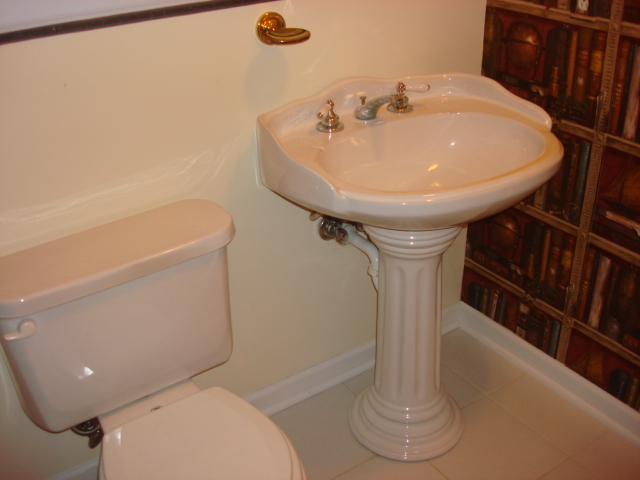 2387 North 24th Road Marseilles, IL 61341 - Photo 13 of 23 a bathroom with a toilet a sink and bathtub