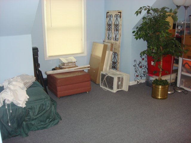 2387 North 24th Road Marseilles, IL 61341 - Photo 16 of 23 a bedroom with furniture and a potted plant