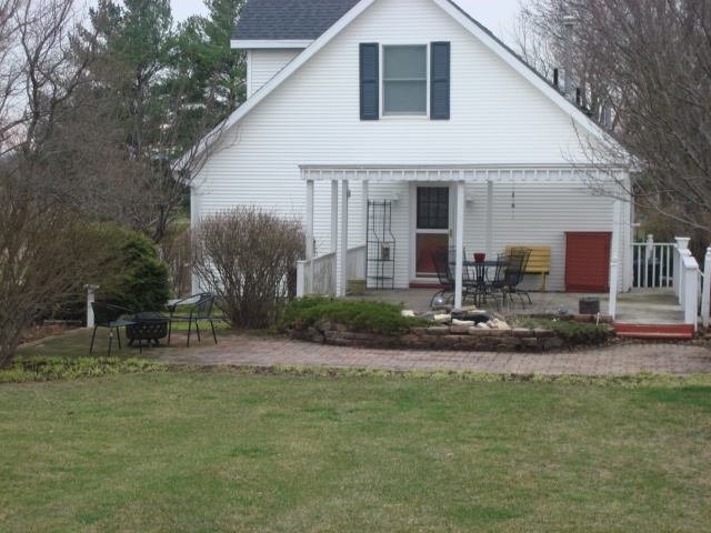 2387 North 24th Road Marseilles, IL 61341 - Photo 2 of 23 a front view of a house with garden