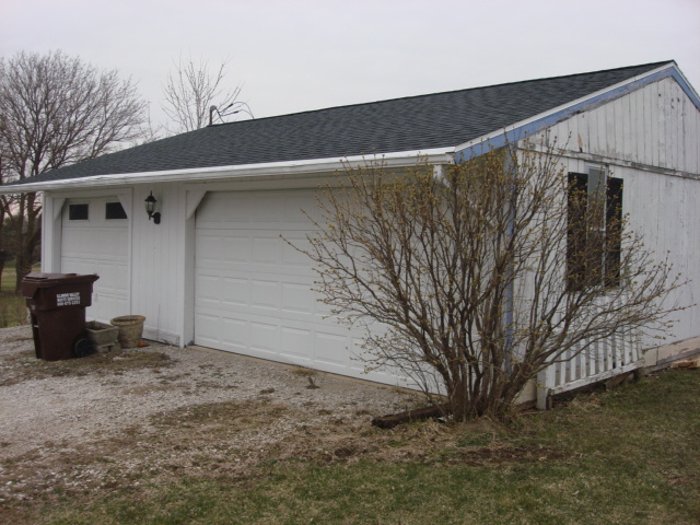 2387 North 24th Road Marseilles, IL 61341 - Photo 22 of 23 a view of a house with a back yard