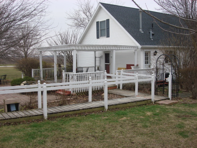 2387 North 24th Road Marseilles, IL 61341 - Photo 3 of 23 a view of a house with a backyard