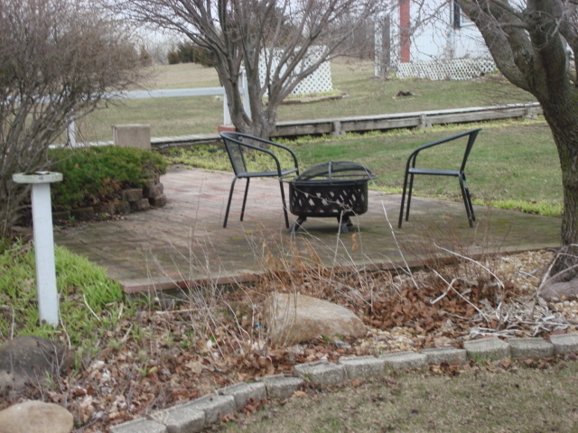 2387 North 24th Road Marseilles, IL 61341 - Photo 4 of 23 a view of backyard with seating area and trees