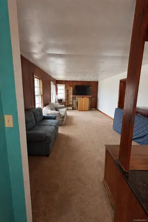 a living room with furniture and a couch