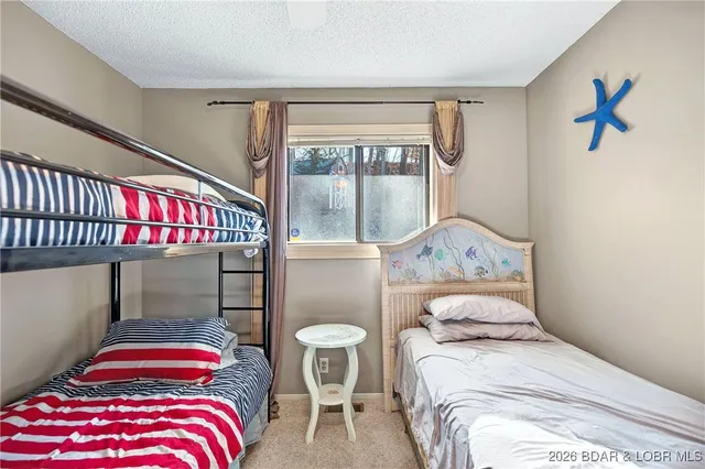 $395,000 | 79 Honeysuckle Road, Unit 79, Lake Ozark, MO 65049