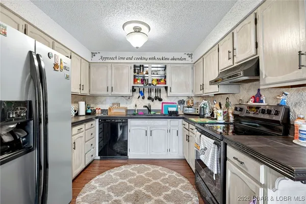 $395,000 | 79 Honeysuckle Road, Unit 79, Lake Ozark, MO 65049