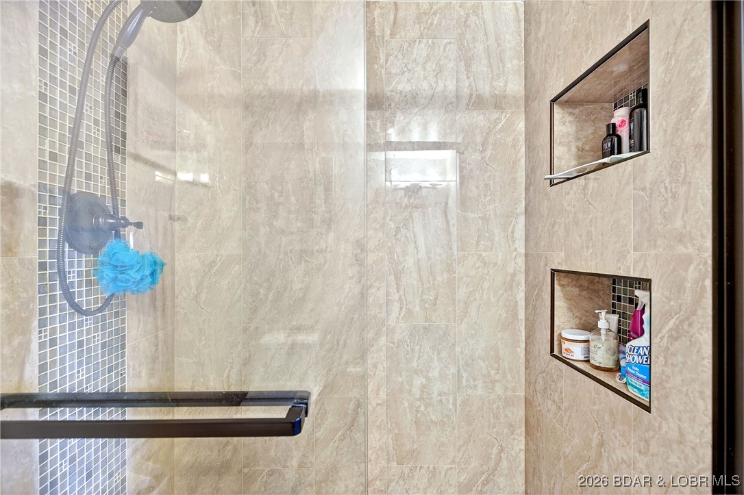 79 Honeysuckle Road, Unit 79 Lake Ozark, MO 65049 - Photo 23 of 54 lower level bathroom