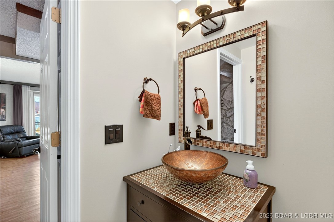 79 Honeysuckle Road, Unit 79 Lake Ozark, MO 65049 - Photo 24 of 54 lower level bathroom