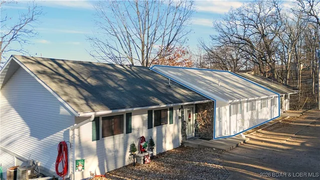 $395,000 | 79 Honeysuckle Road, Unit 79, Lake Ozark, MO 65049