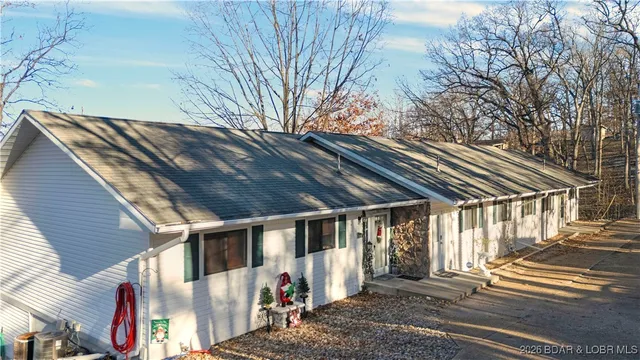 $395,000 | 79 Honeysuckle Road, Unit 79, Lake Ozark, MO 65049