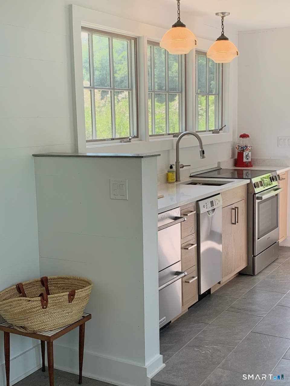 87 Beaver Dam Road Salisbury, CT 06068 - Photo 27 of 35 a kitchen with a sink and a stove