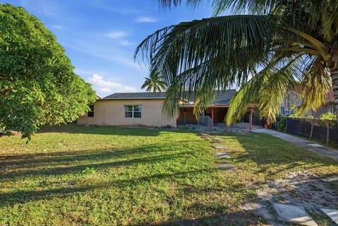 a view of a backyard with a garden