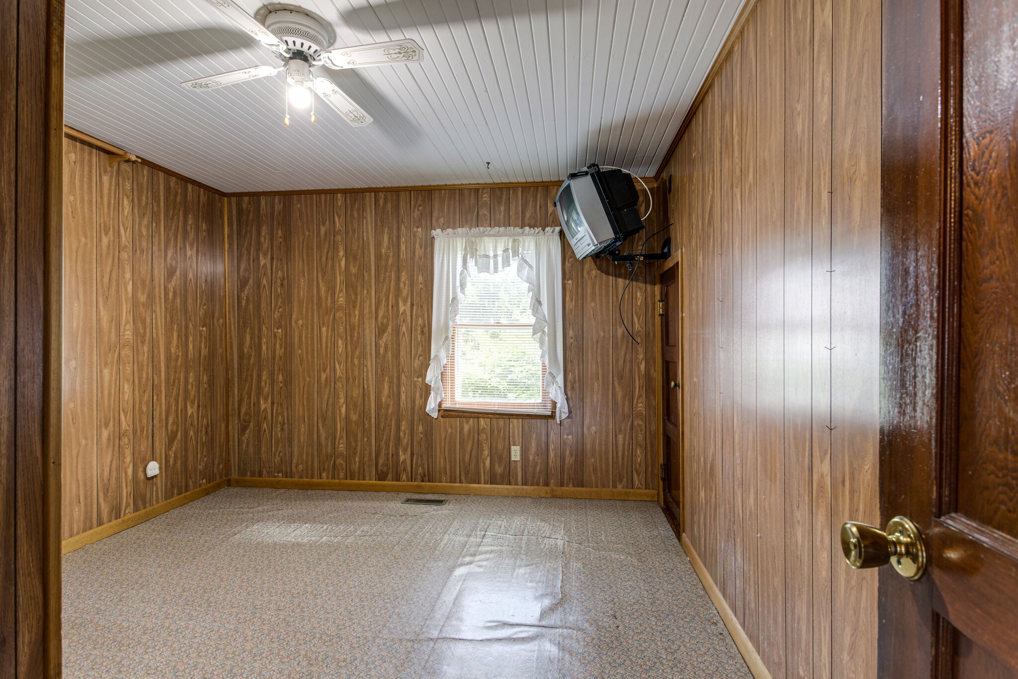 9188 Versailles Road Rockvale, TN 37153 - Photo 11 of 25 wooden floor in an empty room with a window