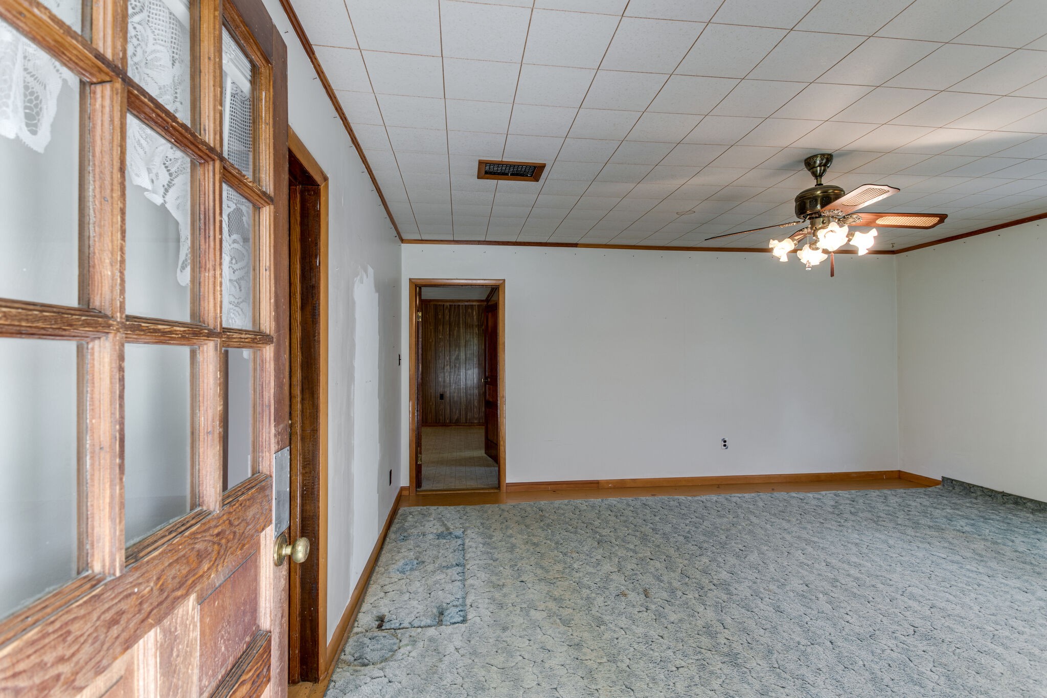 9188 Versailles Road Rockvale, TN 37153 - Photo 3 of 25 a view of an empty room with a window