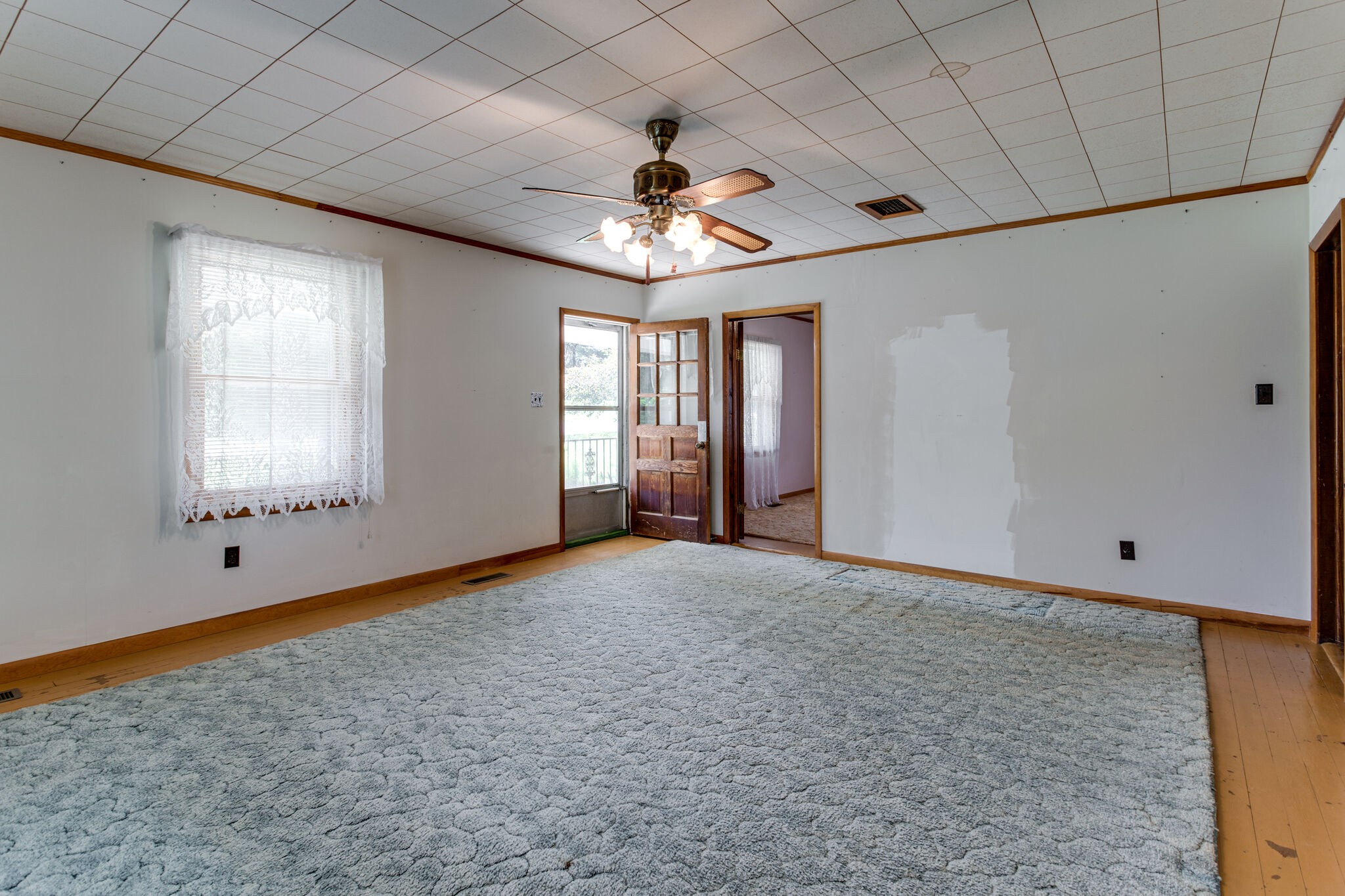 9188 Versailles Road Rockvale, TN 37153 - Photo 5 of 25 a view of an empty room with a window