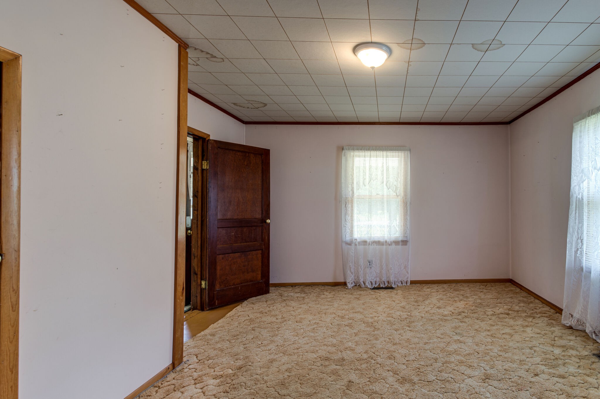 9188 Versailles Road Rockvale, TN 37153 - Photo 7 of 25 an empty room with windows