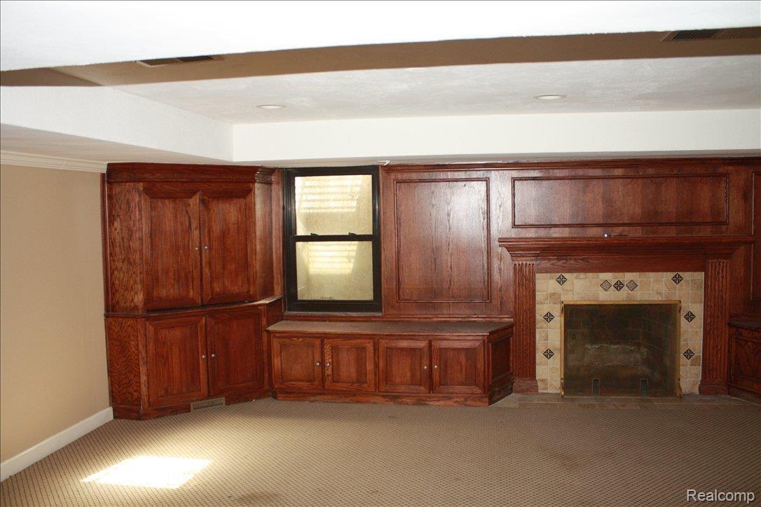 709 Berkshire Road Grosse Pointe, MI 48230 - Photo 17 of 25 basement fireplace