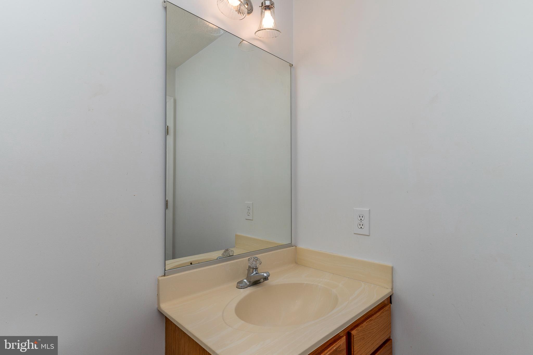 5305 Hollowstone Circle Rosedale, MD 21237 - Photo 11 of 22 Half Bathroom