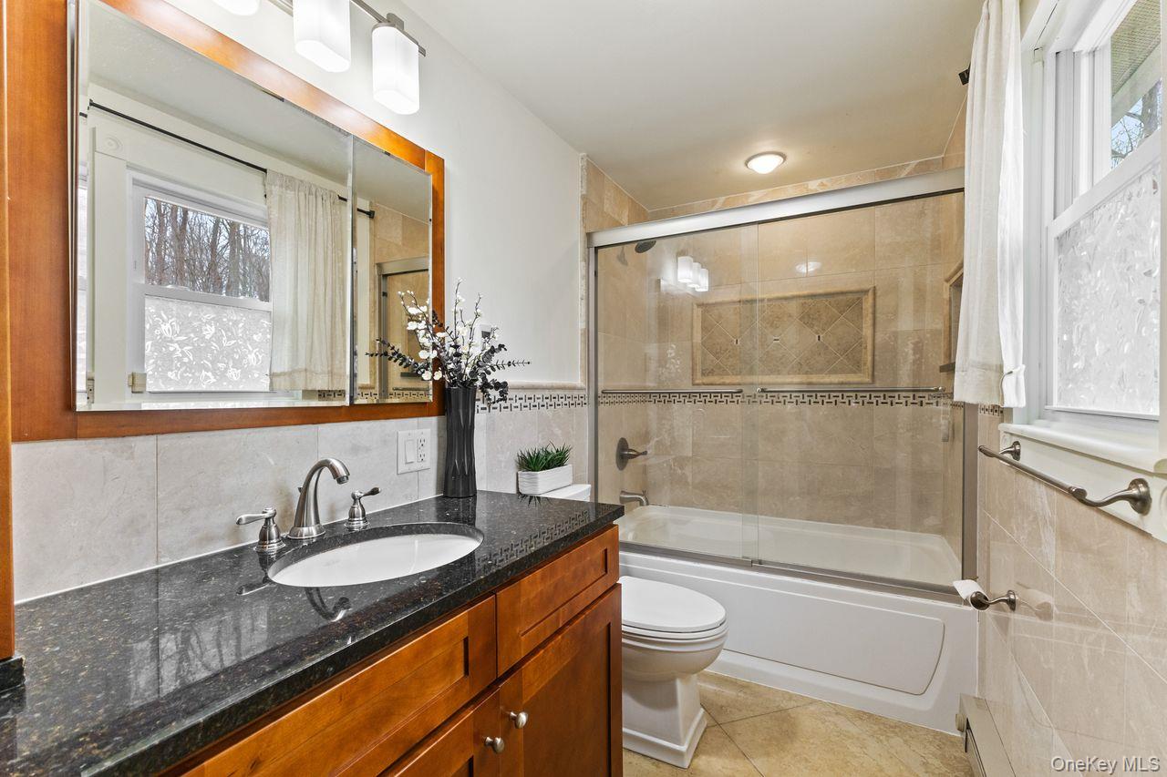 4 Stonewall Farm Road Mahopac, NY 10541 - Photo 19 of 37 Updated primary bathroom with heated floors.